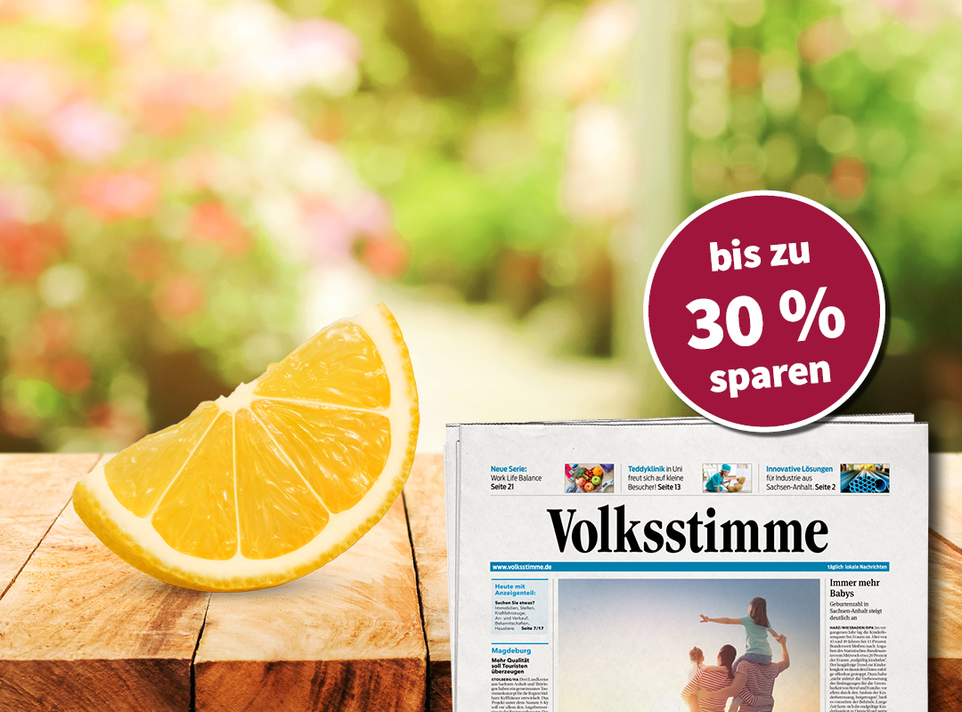 Das Bild zeigt eine Sonnenbrille oben rechts. Auf dem linken Glas der Sonnenbrille steht 