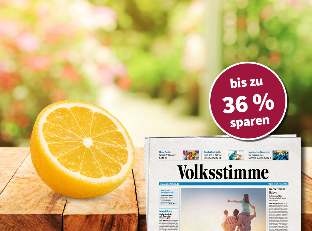 Das Bild zeigt links eine weiße Sonnenbrille. Auf dem rechten Glas der Sonnenbrille steht 
